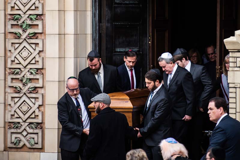 Unity in tragedy as mourners gather at first funerals for victims in synagogue massacre 