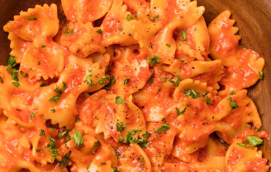 Zesty and bright-tasting, this bowtie pasta with spicy vodka cream sauce will -- post-enjoyment -- leave less regret but maybe some damn-the-calories rationalizing
	
	