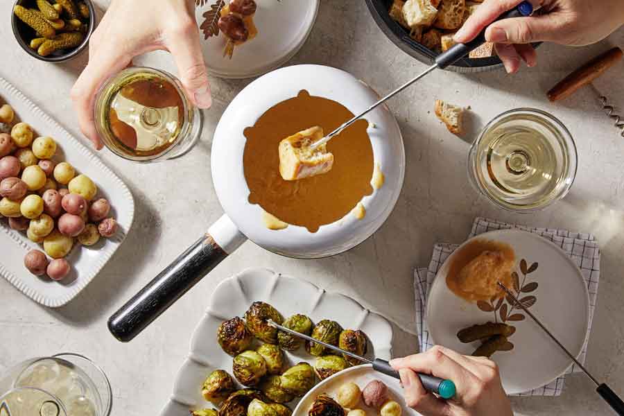Fondue may feel retro, but sharing a pot of hot, melted cheese is timeless
	
	
