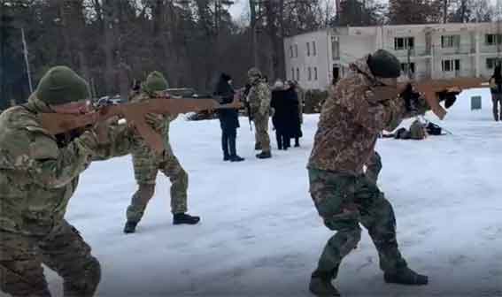  Ukrainian civilians train for war with cardboard guns: 'We are scared but we are ready'
   