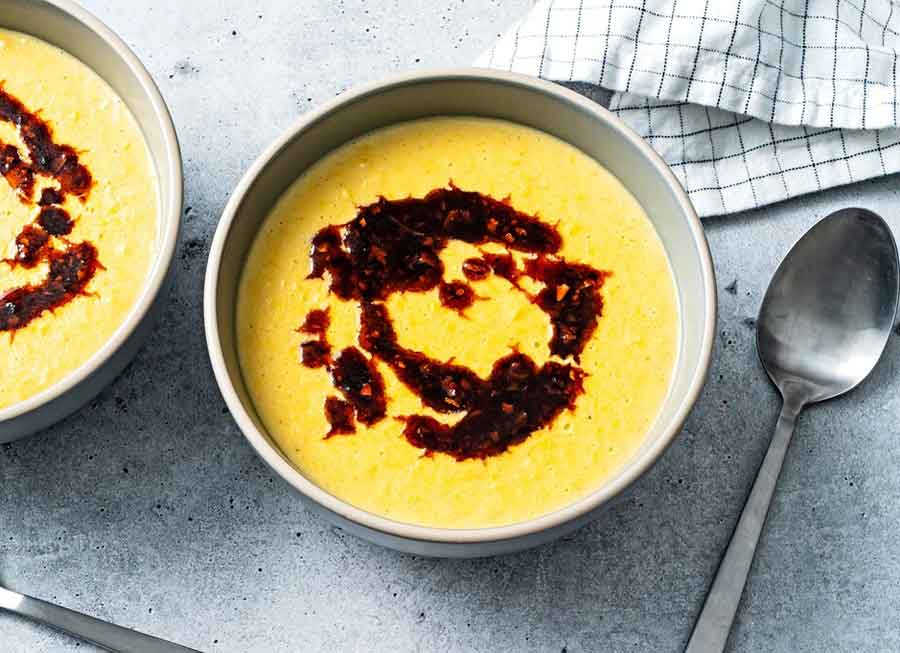 Corn soup with chili crisp is a sweet and spicy bowl of comfort
	