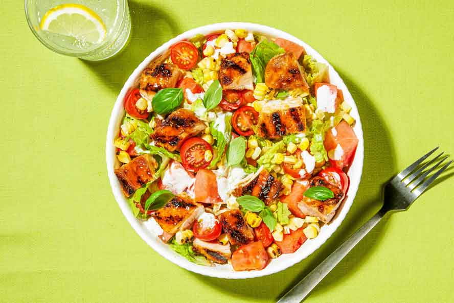 Grilled chicken salad with corn and watermelon is summer in a bowl

