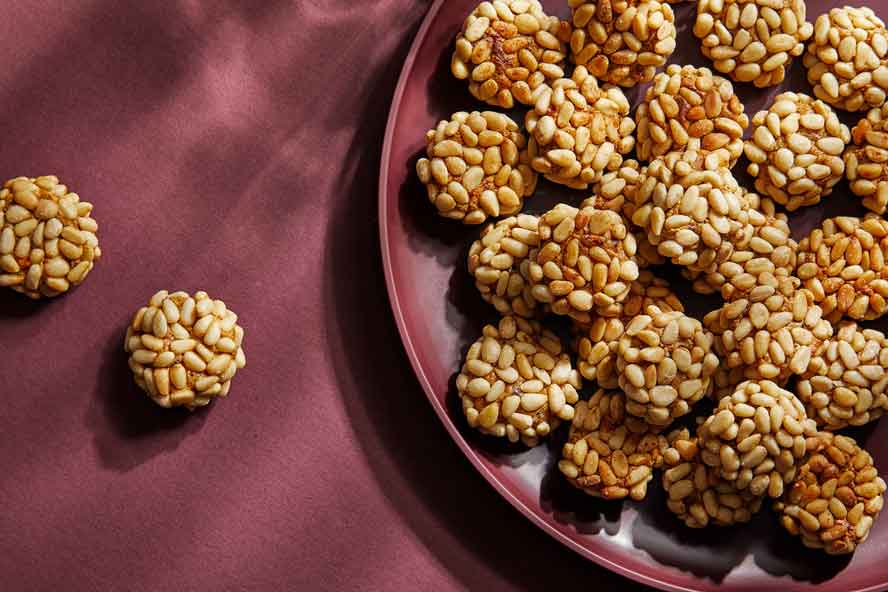 Sweet, whole-food pine nut cookies are delicately sweet, with a crunchy, buttery coating. And YUM!
