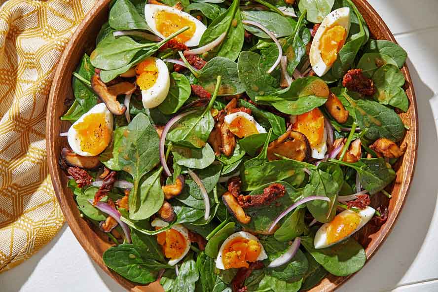 This warm spinach salad with shiitakes is rich with savory, smoky flavors
	